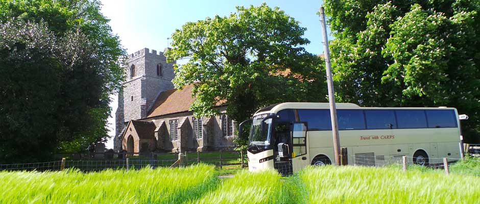 Carrs coach outside Snargate Church